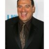 Comedian Carlos Mencia pleads not guilty to 12 felony charges of failure to pay taxes