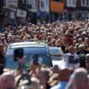 Bonnie Tyler fans line the streets of a Welsh village as her coffin is brought home