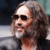 UK prosecutor labels Russell Brand a ruthless sexual predator as his sex assault trial begins